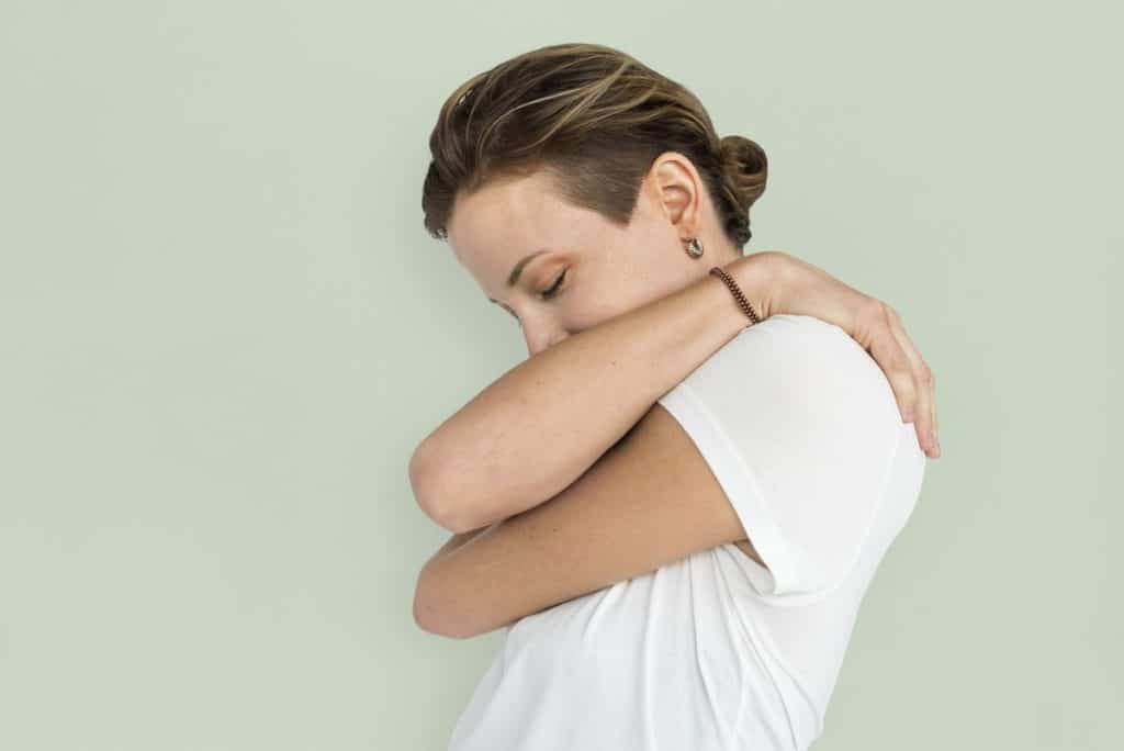 female hugging self-self esteem